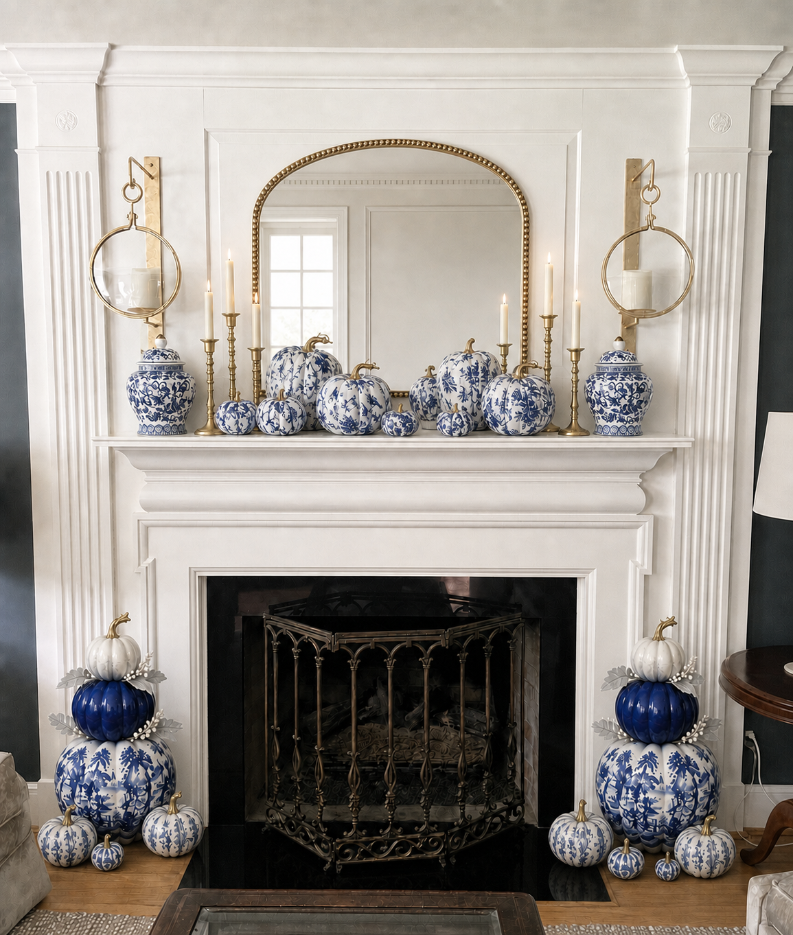 Blue and white chinoiserie pumpkins and ginger jars arranged across a white fireplace mantel